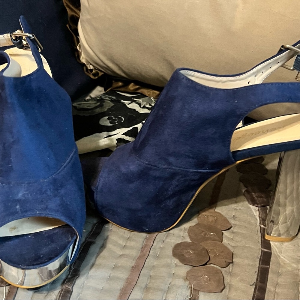 Size 8 blue suede 3 inch heels with silver heel. Excellent condition